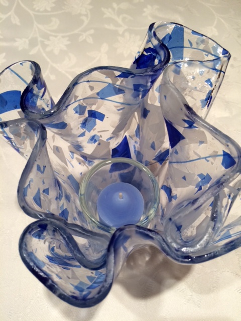 Slumped confetti glass candle holder.